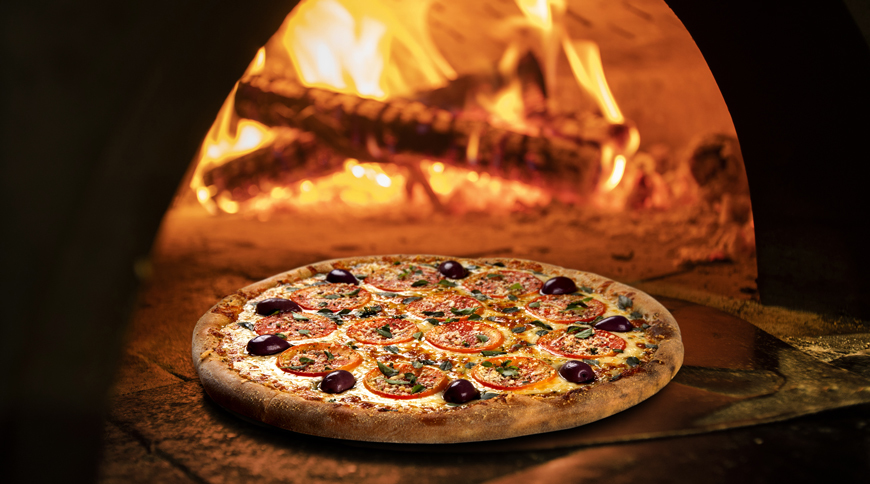 Nos Pizzas sont cuite dans un four traditionnel
